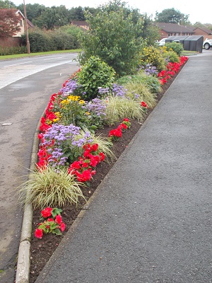 View of flower bed on Springfield Road near Spar shop