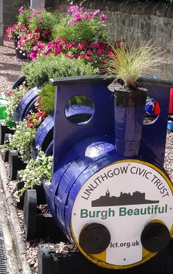 Planted up wooden train